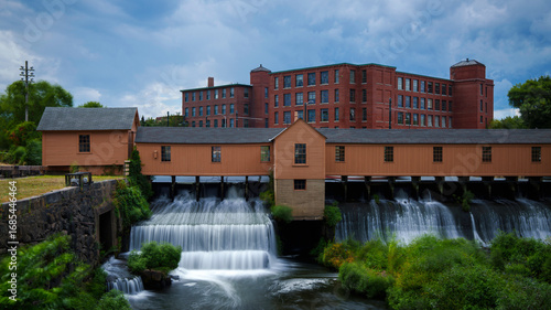 Картината върху платно Lower Locks Gatehouse in Lowell, Massachusetts features ten wooden gates that regulate the Merrimack River, a Historic Civil Engineering Landmark within the Lowell National Historical Park