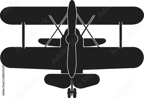 A classic biplane silhouette against the sky, showcasing the iconic design of a vintage aircraft