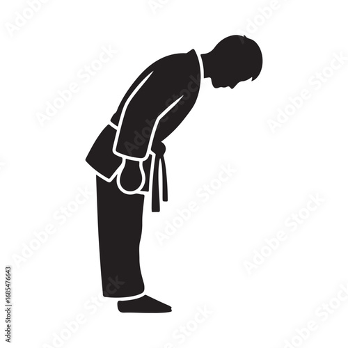 Silhouette of a Person in a Martial Arts Uniform Bowing Respectfully