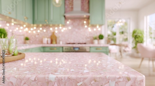 Modern pink themed kitchen with pink terrazo countertop with pastel turquoise cabinetry and illuminating lights. Ideal for product mockup, design showcase and modern lifestyle visual