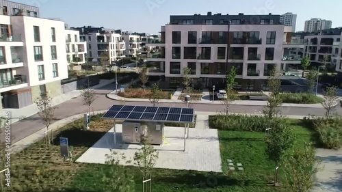 A modern residential complex with green spaces provides a serene and sustainable living environment for community members.