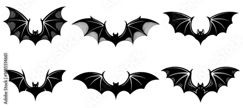 Vector art of set of bat silhouettes with different wing positions