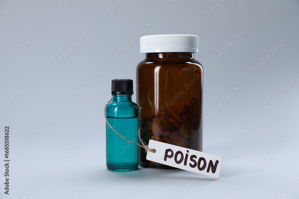 Obraz premium Bottles of poisons on light grey background