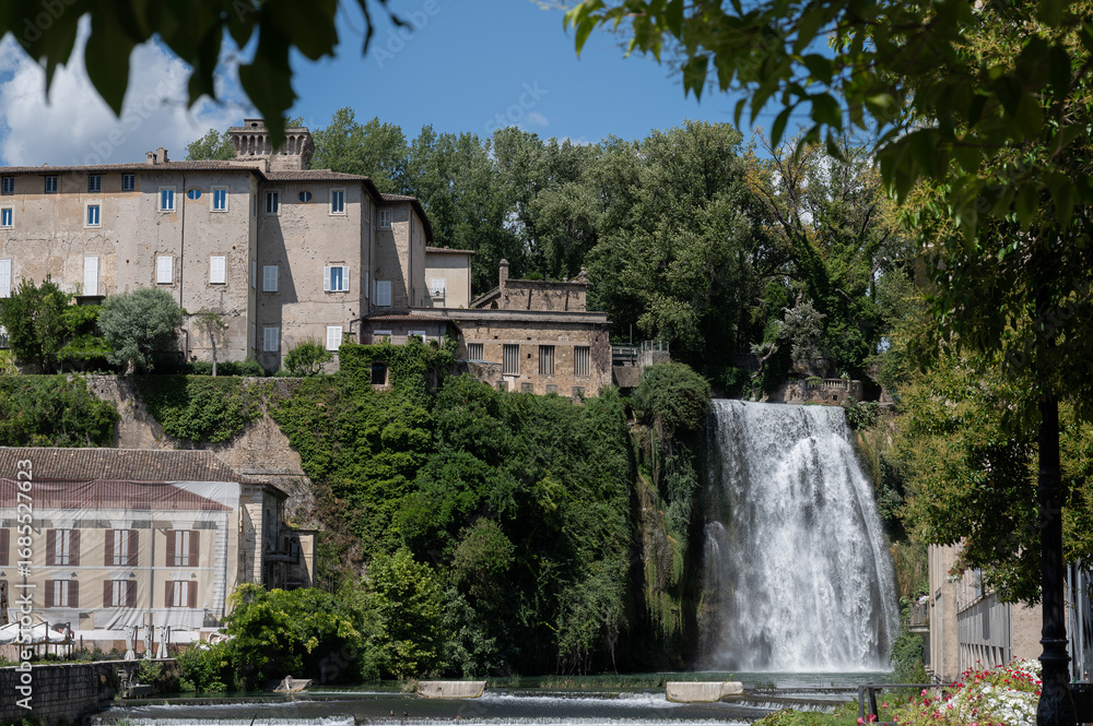 Fototapeta premium The Cascata Grande is formed by the left arm of the Liri River and is approximately 27 meters high:one of the few waterfalls to be found in the historic center of a city, unique in Italy and in Europe