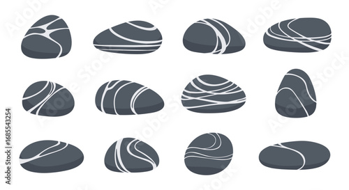 Collection of smooth dark gray river stones with white natural swirling patterns