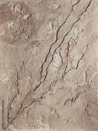 Textured abstract background featuring intricate patterns and natural lines, showcasing a blend of earthy tones and organic shapes for artistic design purposes