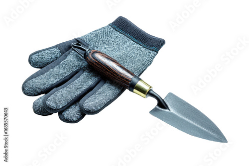 Gardening trowel and gloves.  Grey fleece work gloves rest beside a dark metal trowel with a wooden handle