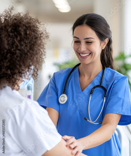 Wallpaper Mural Compassionate nurse smiling while interacting with patient in healthcare setting, showcasing empathy and professionalism Torontodigital.ca