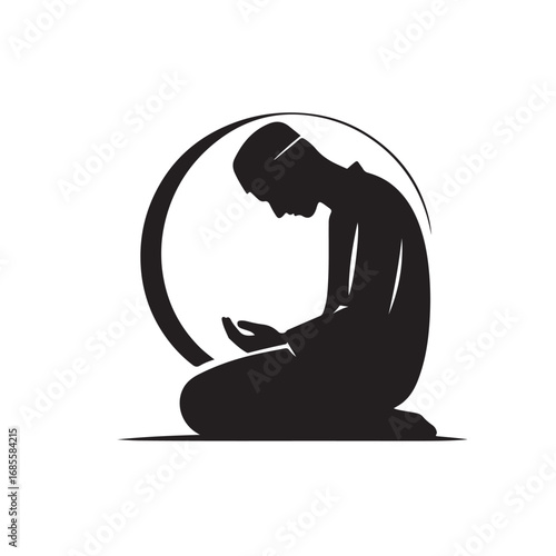 Man performing islamic prayer in a dark silhouette