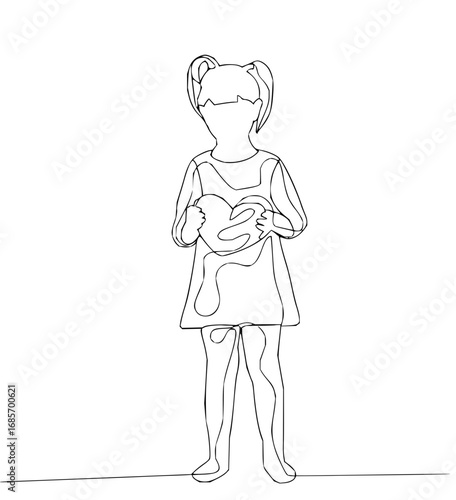 Sweet child tenderly holds a heart, symbolizing innocence and love, perfect for heartwarming projects.