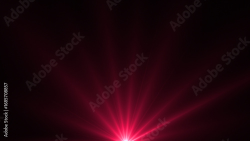 Magenta red color optical flares or futuristic light rays shining on black background