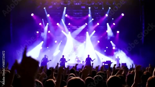 A vibrant live music concert with a band performing on stage under colorful spotlights, while a cheering audience with raised hands enjoys the show
