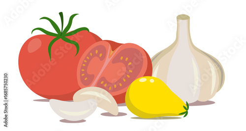 Tomatoes and garlic.  Red and yellow cocktail tomatoes. Garlic cloves.