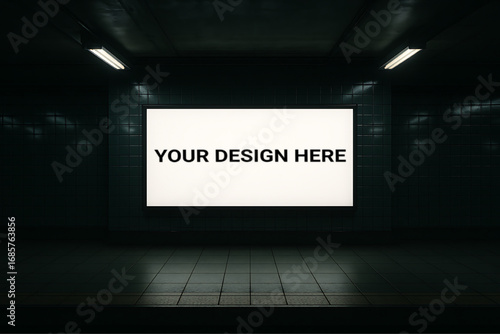 An empty subway hall with a blank billboard for advertisement