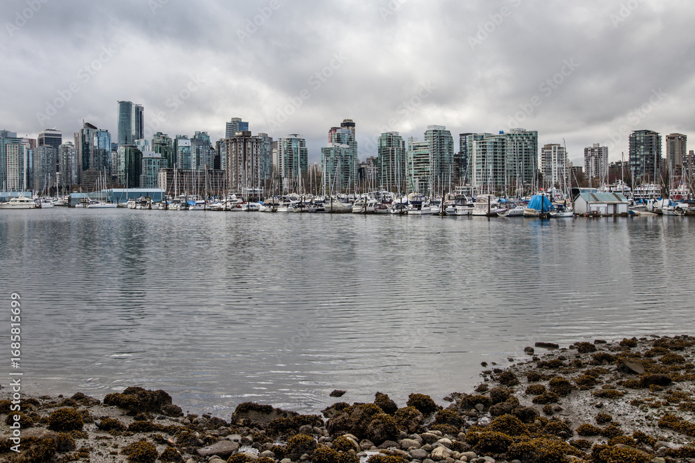 Fototapeta premium High-rise buildings with modern glass facades in the city of Vancouver, BC Canada. 