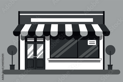 Charming small shop with striped awning and potted plants during daytime