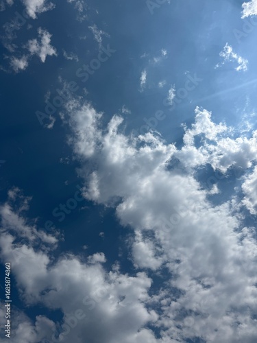 Fluffy clouds in blue sky