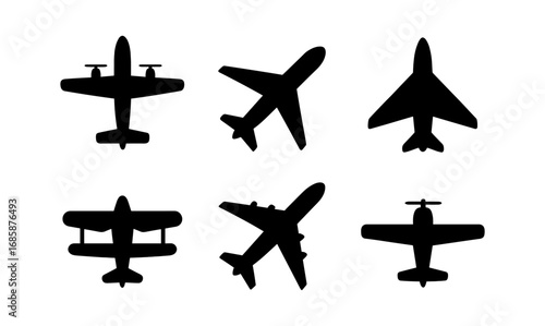 Airplane silhouettes collection: diverse aircraft designs in black silhouette style