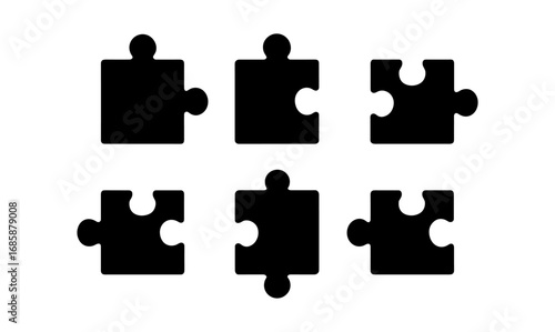 Set of six silhouette puzzle pieces in black