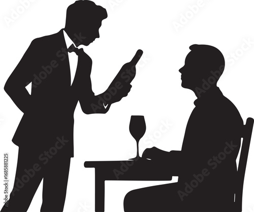 Waiter in tuxedo presenting wine bottle to seated man at table with wine glass bow tie