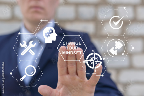 Business person using virtual touch screen presses the words CHANGE YOUR MINDSET. Change Your Mindset Business Personal Self Development Concept.