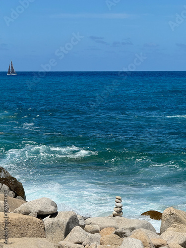 Wallpaper Mural Mediterranean Sea in Calabria, Italy, sailing yacht and sea surf among rocks Torontodigital.ca