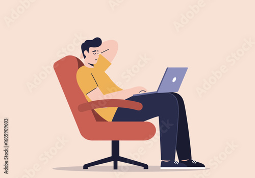 Man relaxing in chair with laptop, contemplating ideas, seeking inspiration, or working remotely
