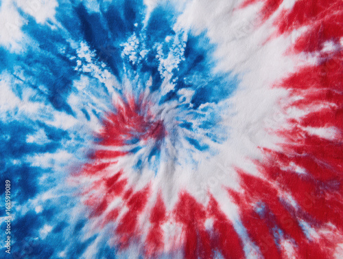 Abstract tie-dye swirl in red, blue, and white