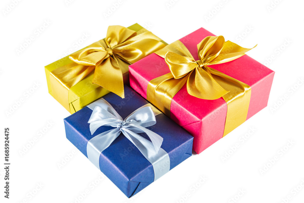 Obraz premium Elegant blue, gold and pink gift boxes with bows isolated on white background.