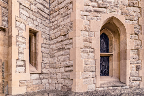 Gothic building detail inside the Tower of London
Two small windows to inspect who arrives.