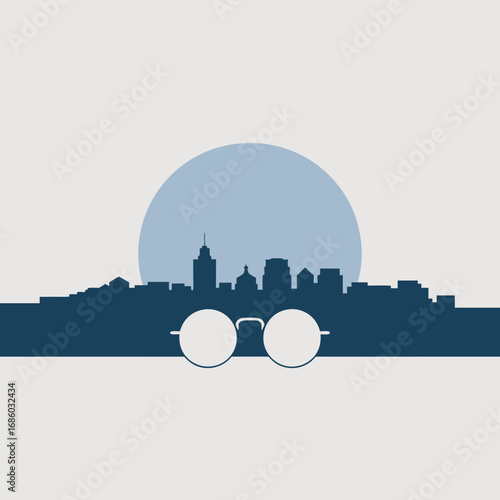 Elegant vector illustration pays homage to the iconic round spectacles reminiscent of Mahatma Gandhi, set against a serene urban landscape silhouette with a peaceful sunrise