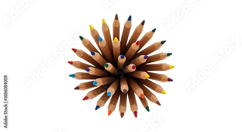 Top view of a colorful assortment of sharpened wooden pencils fanned out colored pencils