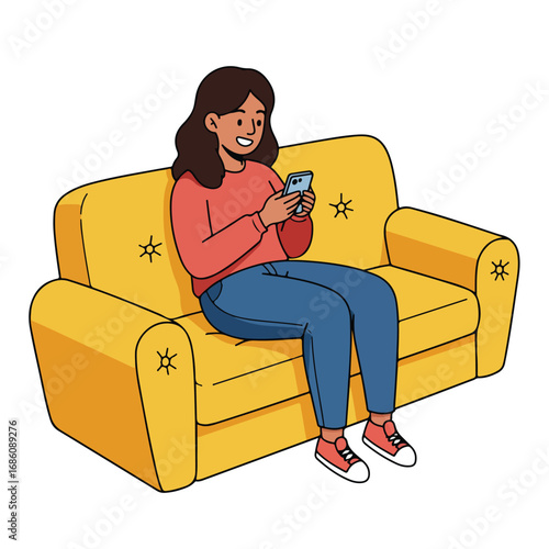 A woman sits on a yellow couch looking at a smartphone
