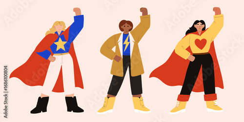 Three diverse women in superhero costumes striking powerful poses with raised fists celebrating strength and unity