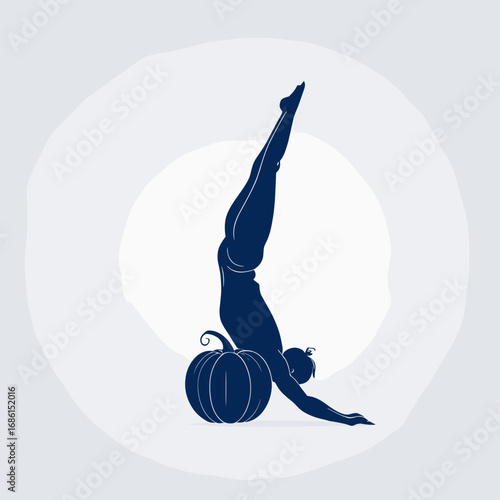 Flexible Halloween character performing a handstand on a pumpkin