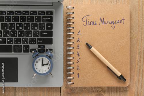 Notebook with text TIME MAN...
