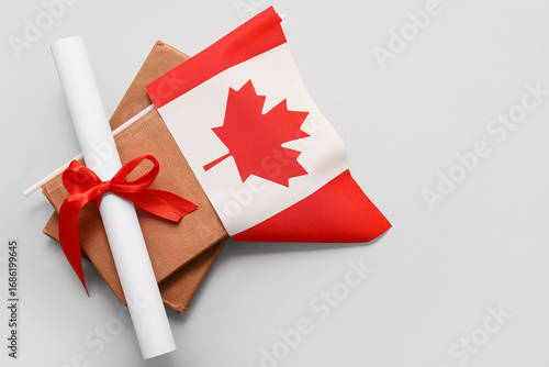 Diploma with red ribbon, bo...