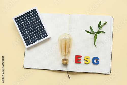 Notebook with ESG, plant, l...