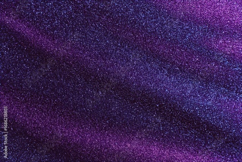 Abstract purple and blue glitter texture with diagonal lines