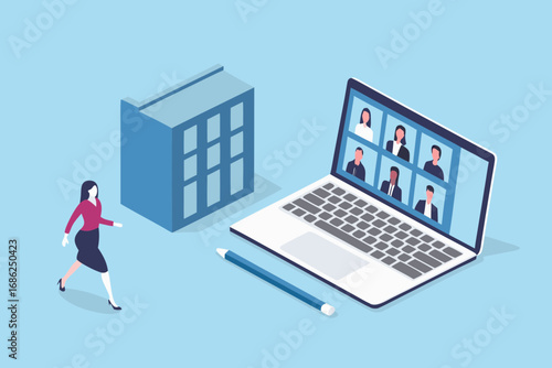 Businesswoman walking towards a laptop displaying a video conference with multiple participants and a building in the background