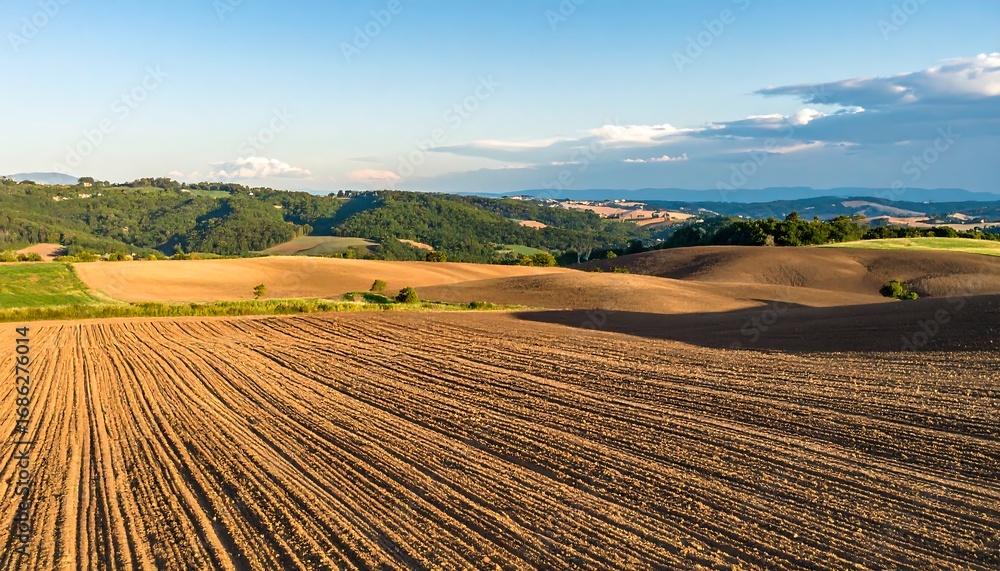 Fototapeta premium Rolling hills, plowed fields
