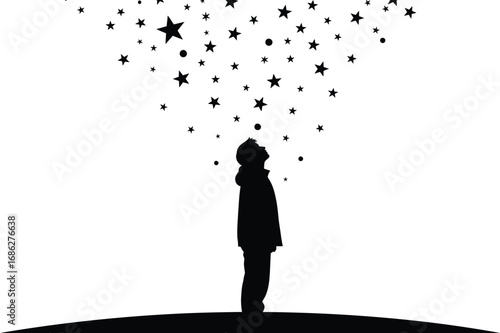 Silhouette of a person looking up at stars, symbolizing dreams and beauty of night sky