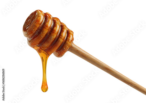 Honey dripping from a wooden honey dipper