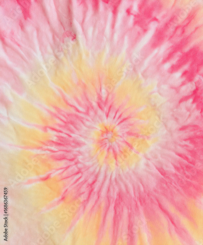 Close-up tie-dye fabric with swirling colors