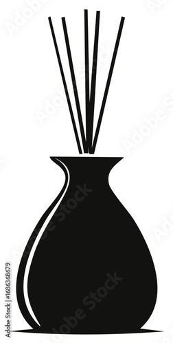 Aromatherapy diffuser reed sticks in a simple black vase silhouette