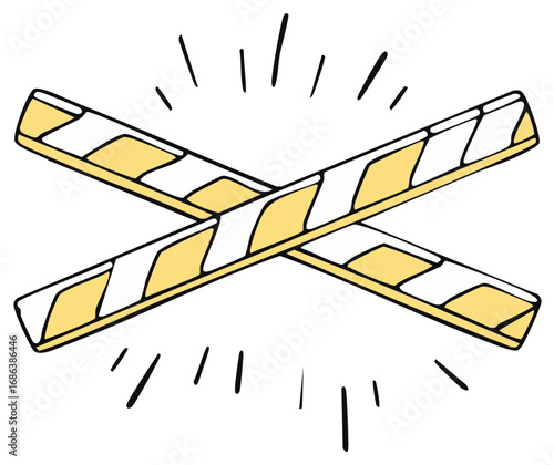 Two crossed wafer cookies with yellow and white stripes and radiating lines