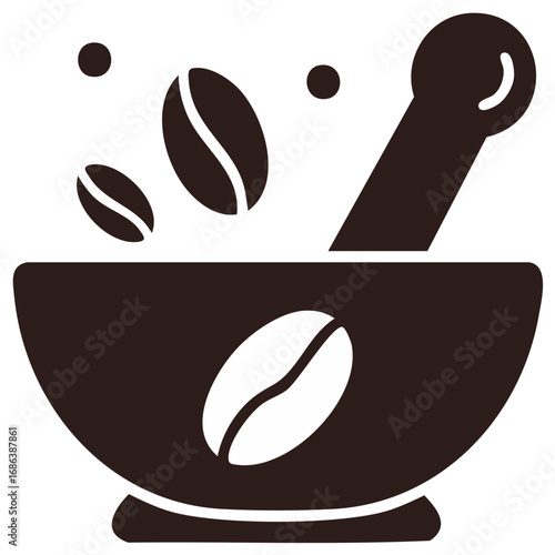 Coffee Beans Being Ground in a Mortar with Pestle