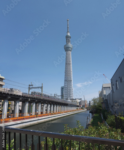 Canvas Print Sumida Tokyo district city street with metro train and tv tower in background
