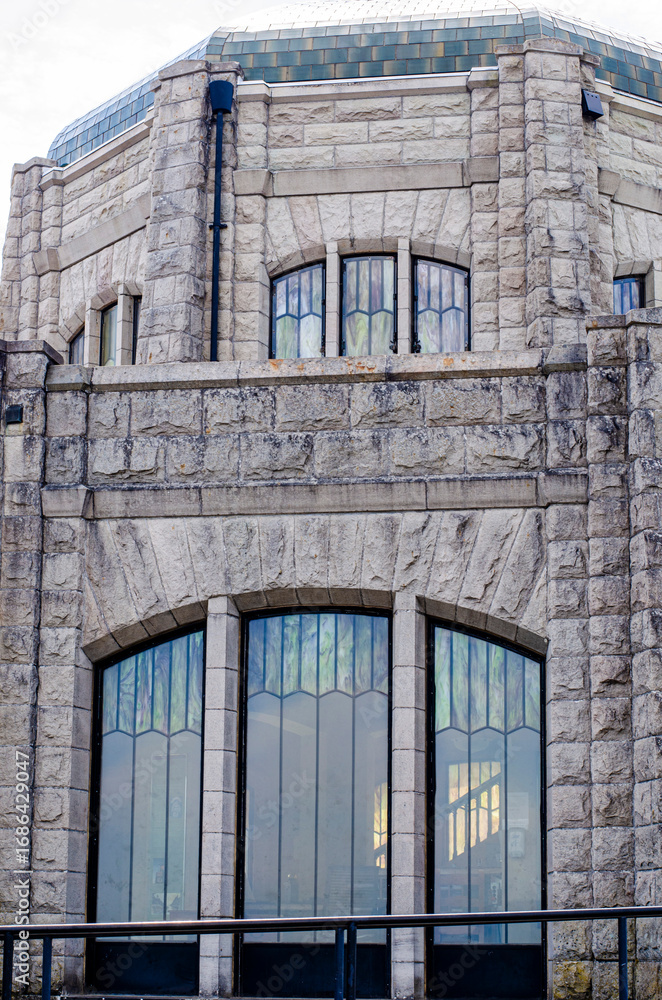 Obraz premium Art deco windows on a historic landmark in Oregon called the Vista House. A beloved Columbia River Gorge attraction completed in 1918