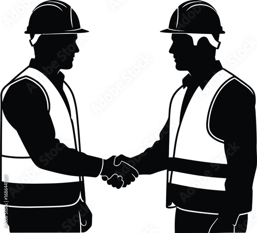 Silhouette of two construction workers shaking hands a, symbolizing collaboration and teamwork in industry